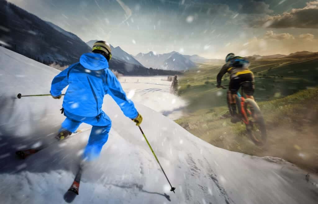Deux athlètes en action, l’un en ski sur neige et l’autre en VTT sur sentier, créant un contraste entre sports d’hiver et d’été, image utilisable pour dynamiser une section comparative de l’article.